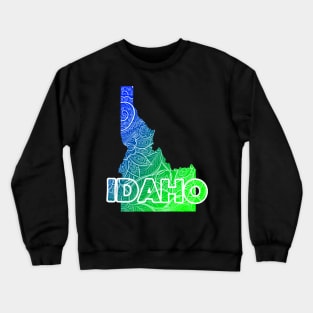 Colorful mandala art map of Idaho with text in blue and green Crewneck Sweatshirt